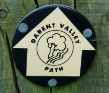 Round waymarker disc with the wording Darent Valley Path
